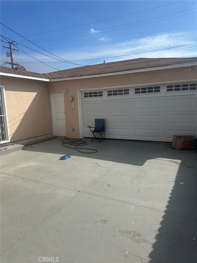 404 South Poinsettia Avenue Compton, CA 90221 - Photo 4 of 5 a view of a garage