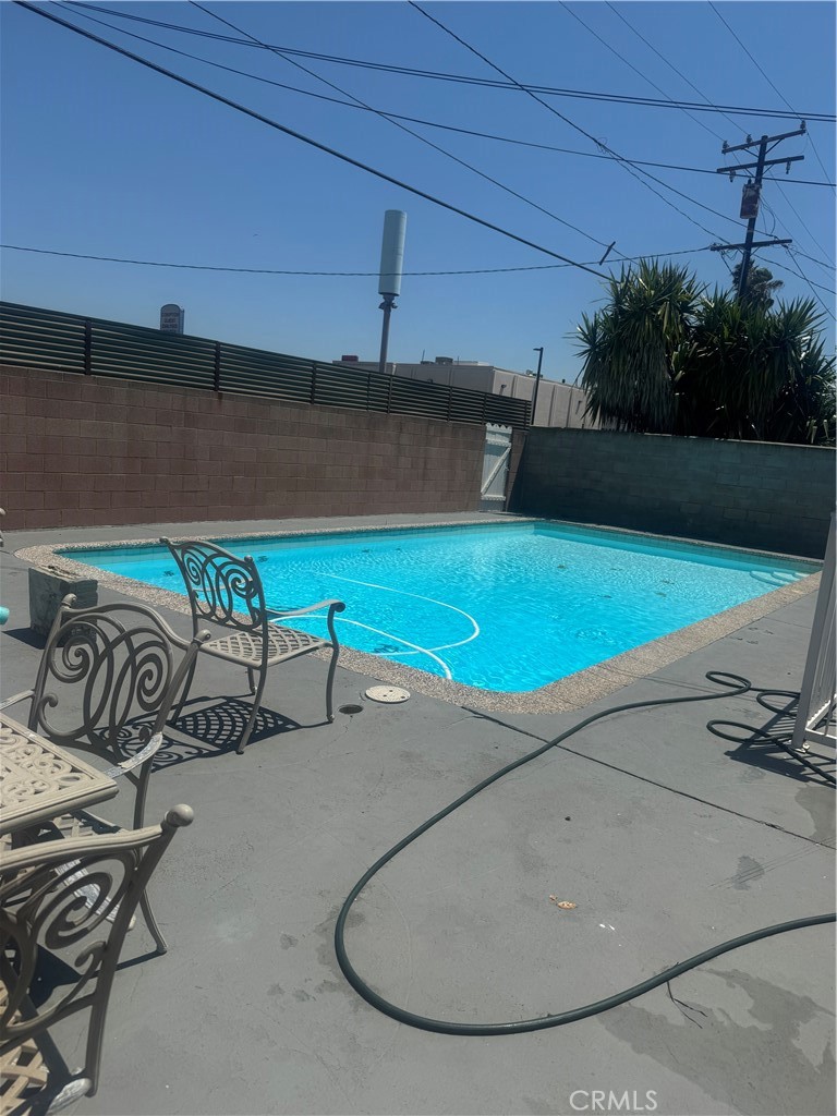 404 South Poinsettia Avenue Compton, CA 90221 - Photo 5 of 5 a view of a room with gym equipment