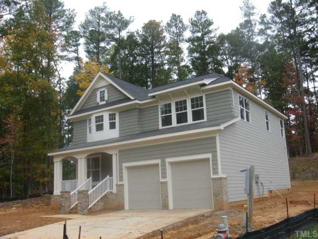 13010 Edsel Drive Raleigh, NC 27613 - Photo 1 of 1 a front view of a house with a garage
