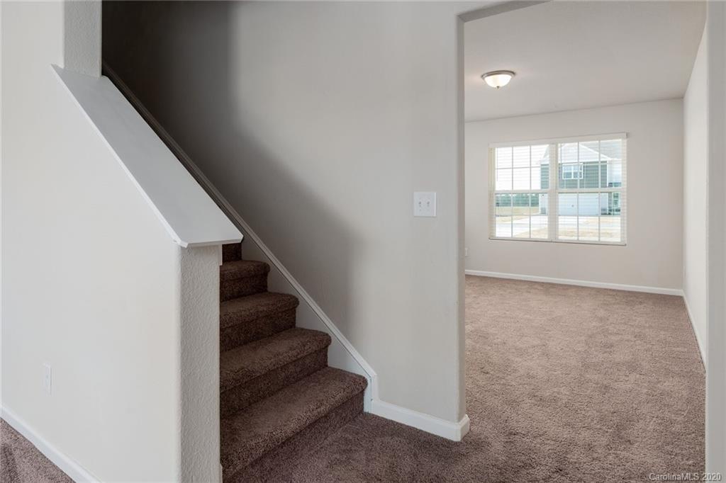 1215 Culver Spring Way Charlotte, NC 28215 - Photo 2 of 13 a view of entryway and hall with wooden floor