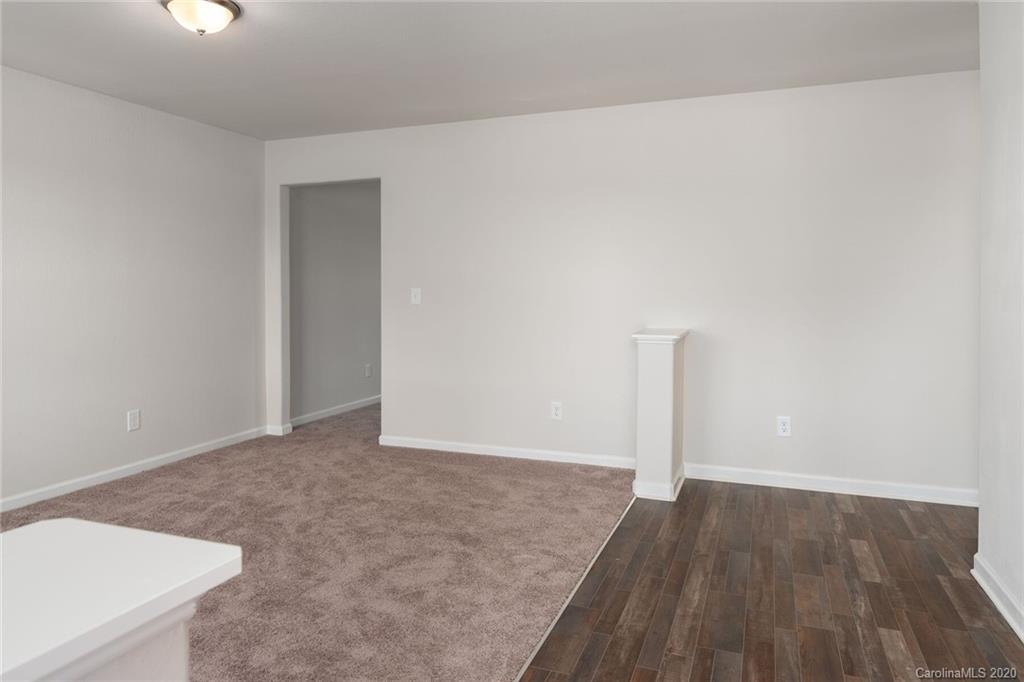 1215 Culver Spring Way Charlotte, NC 28215 - Photo 5 of 13 a view of a room with wooden floor