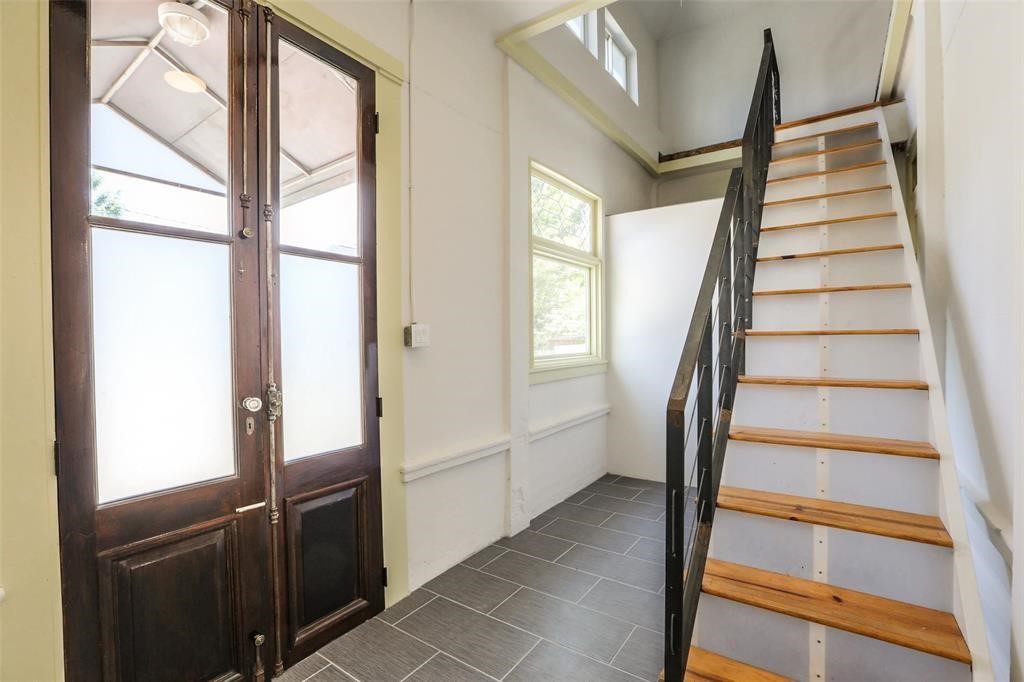 1013 East 26th Street Houston, TX 77009 - Photo 10 of 10 a view of staircase with white walls and windows