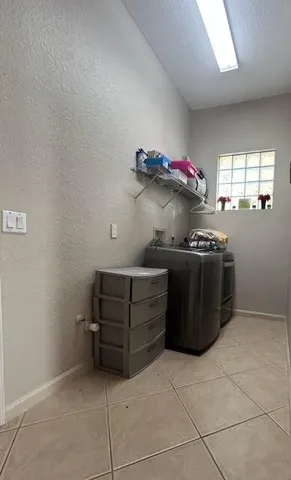 a kitchen with a cabinets and window