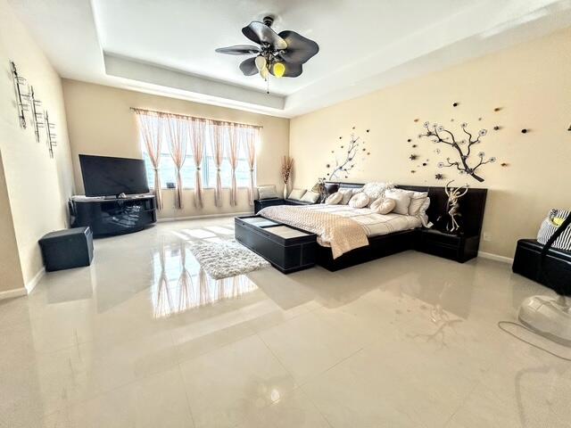 673 Gazetta Way West Palm Beach, FL 33413 - Photo 21 of 35 a bedroom with furniture and a flat screen tv