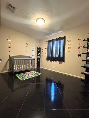 a room with furniture and wooden floor