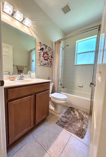 673 Gazetta Way West Palm Beach, FL 33413 - Photo 35 of 35 a bathroom with a sink a toilet and shower