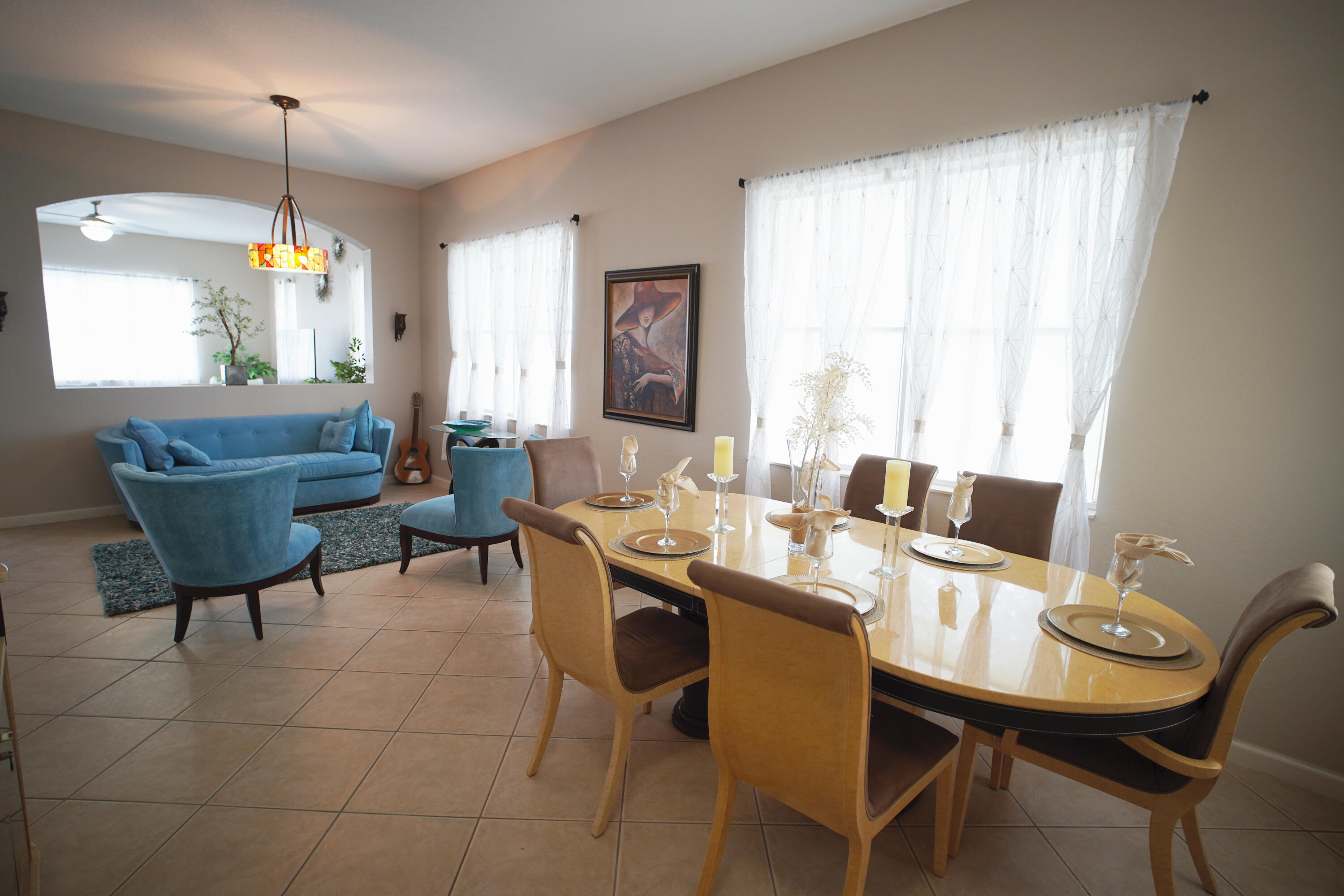673 Gazetta Way West Palm Beach, FL 33413 - Photo 6 of 35 a view of a dining room with furniture window and outside view