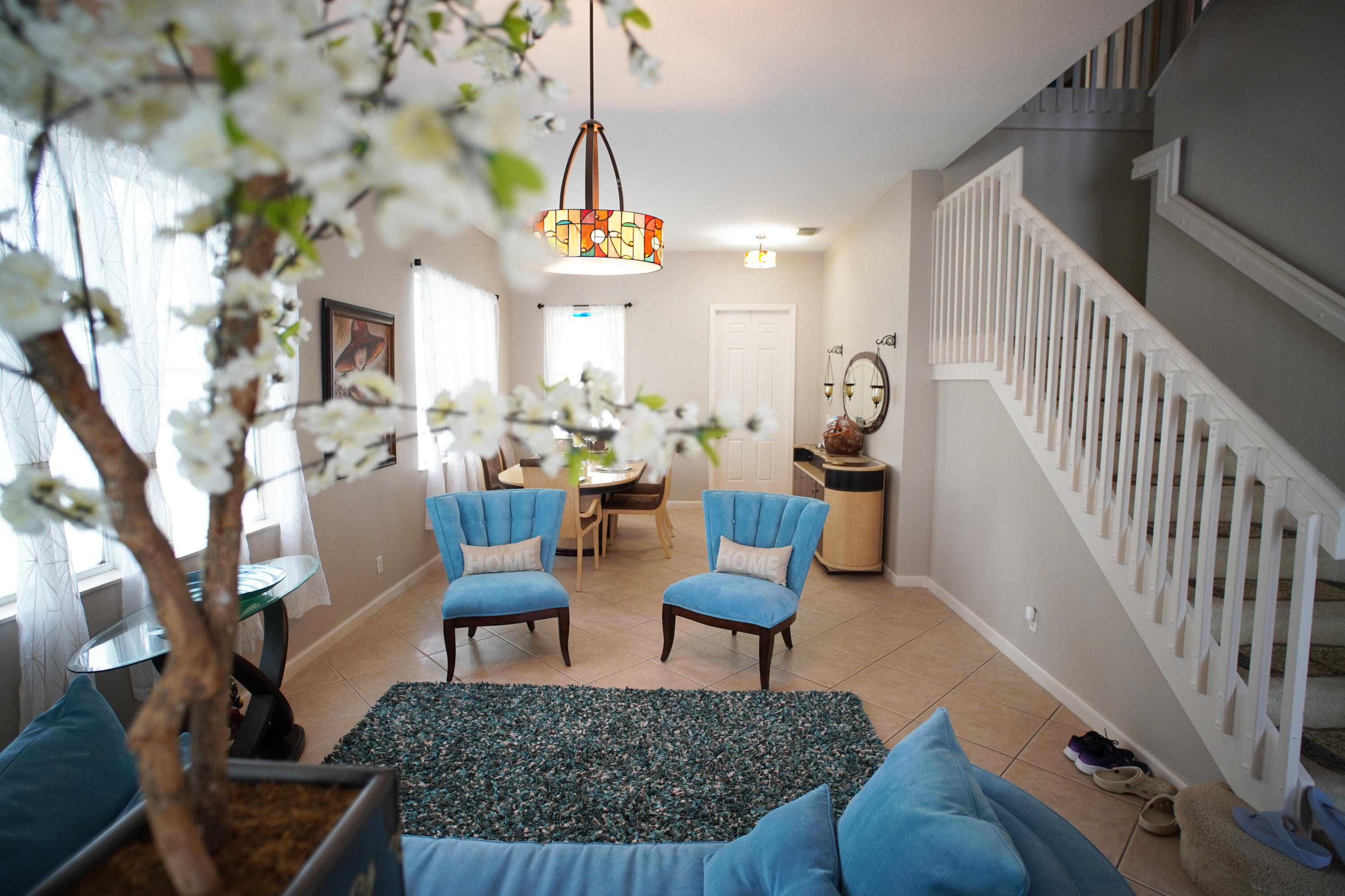 673 Gazetta Way West Palm Beach, FL 33413 - Photo 7 of 35 a living room with furniture and a table