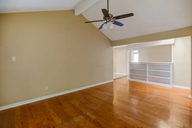 a bathroom with a sink mirror toilet and shower