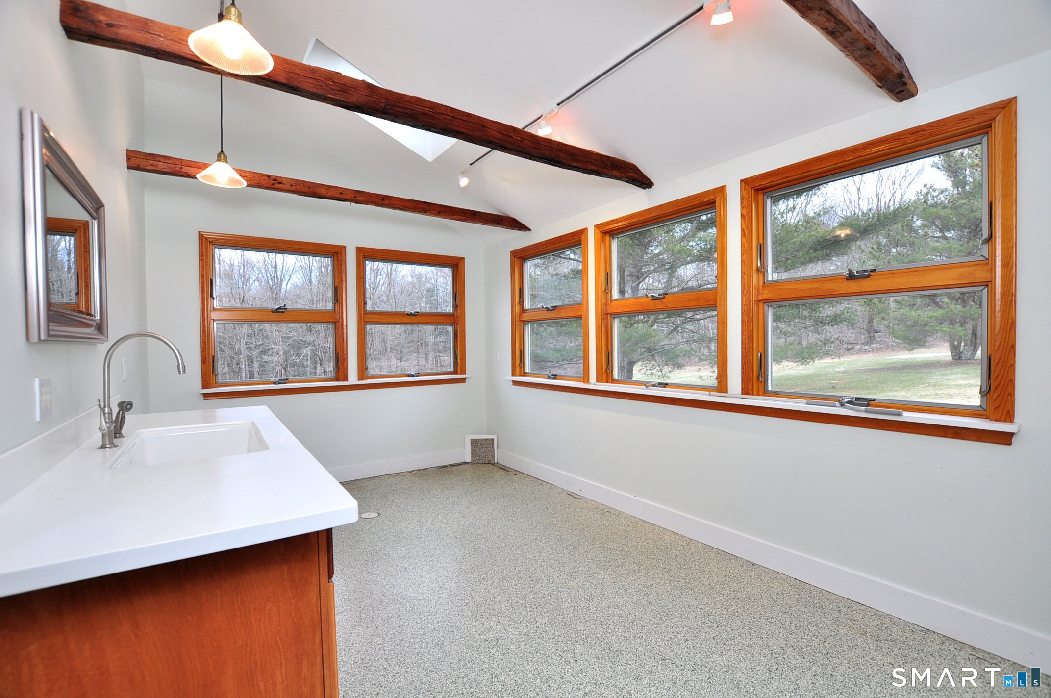 243 Milton Road Goshen, CT 06756 - Photo 22 of 38 Greenhouse room on lower level is perfect for horticultural enthusiasts.