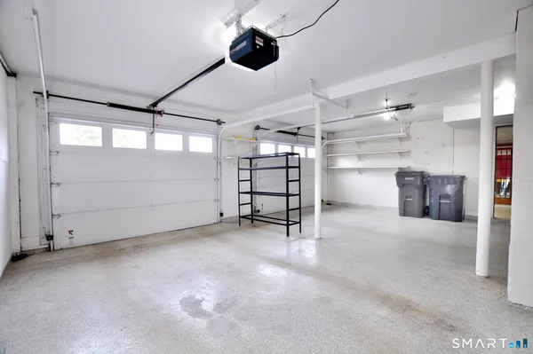 a view of empty room with wooden ceiling