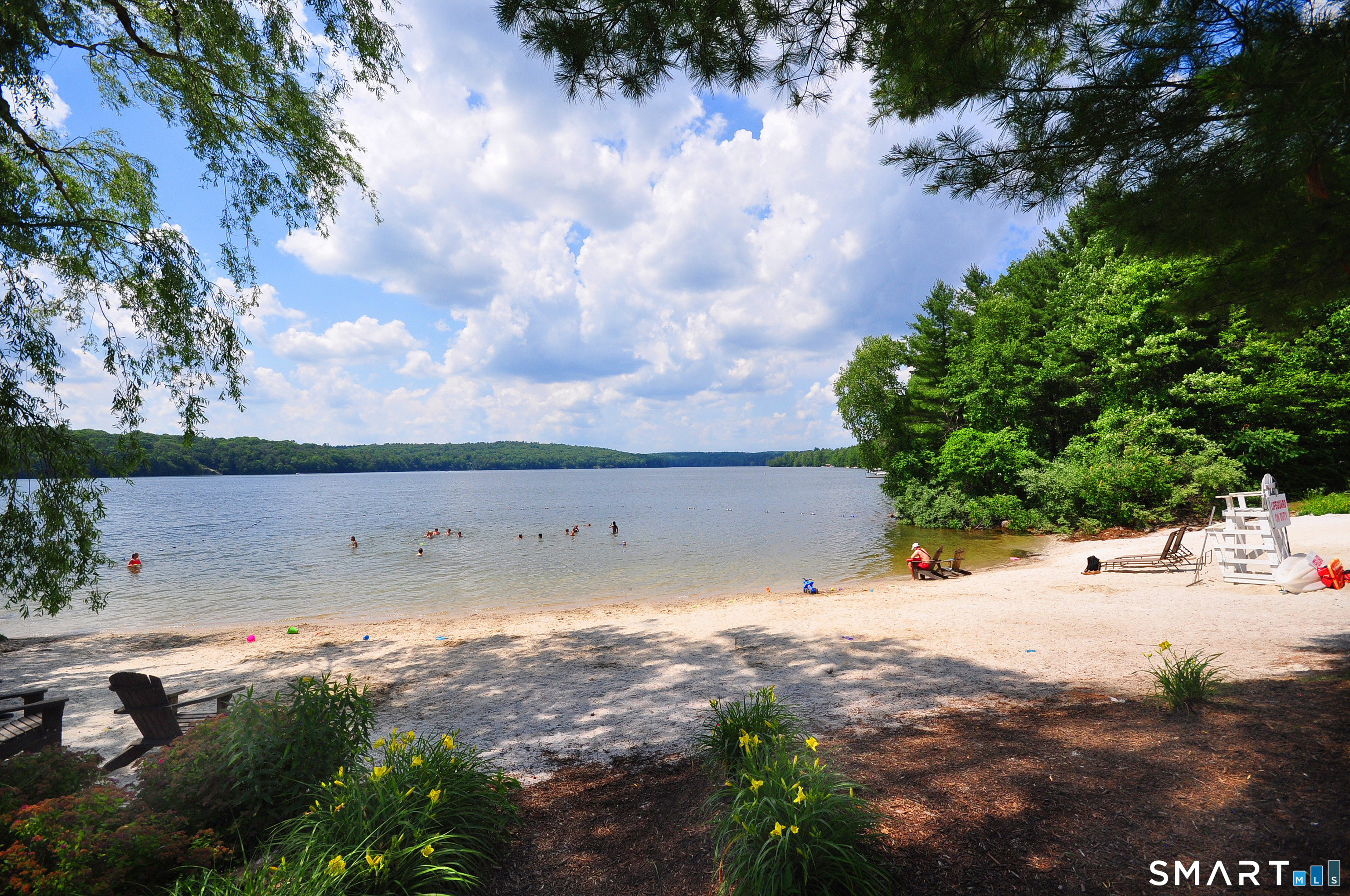 243 Milton Road Goshen, CT 06756 - Photo 35 of 38 Large and sandy beach located at the clubhouse. Nearby are the pool, Snack Shack and numerous picnic tables with grills.