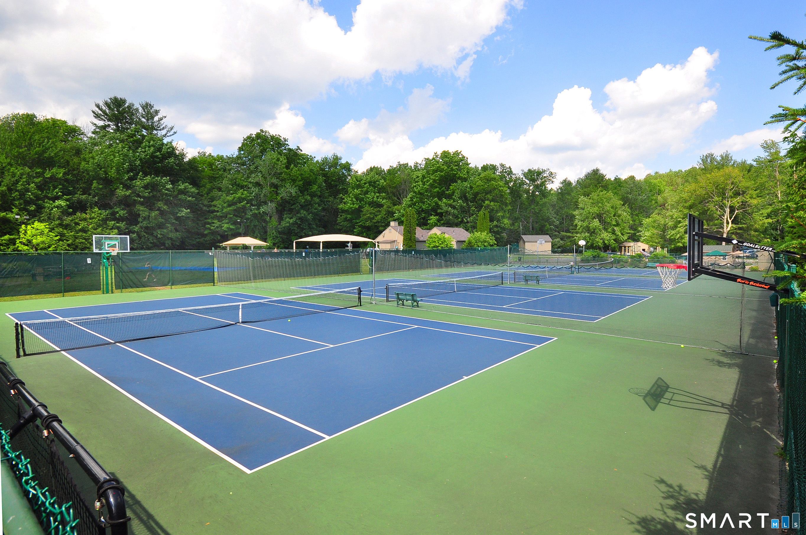 243 Milton Road Goshen, CT 06756 - Photo 38 of 38 The Clubhouse offers a number of tennis courts, and of course, pickleball courts as well.