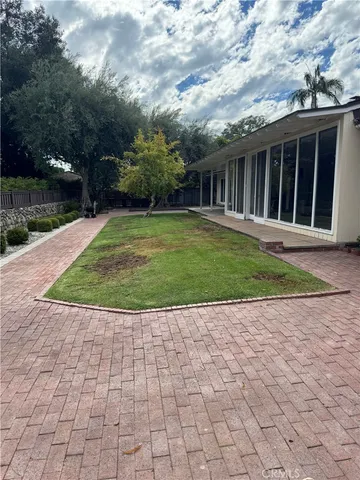 a view of a backyard with a garden