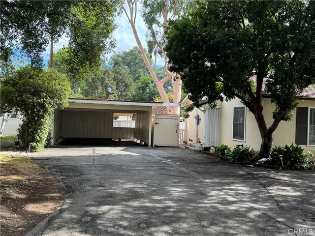a view of a house with a garden
