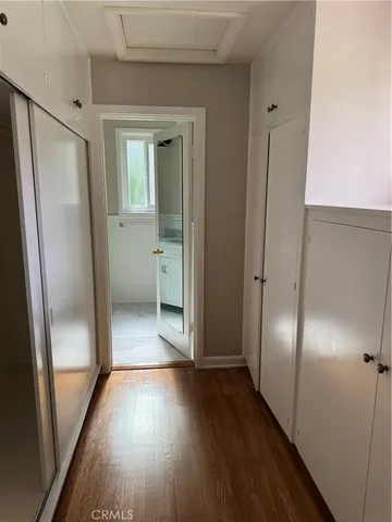 a view of entryway with wooden floor