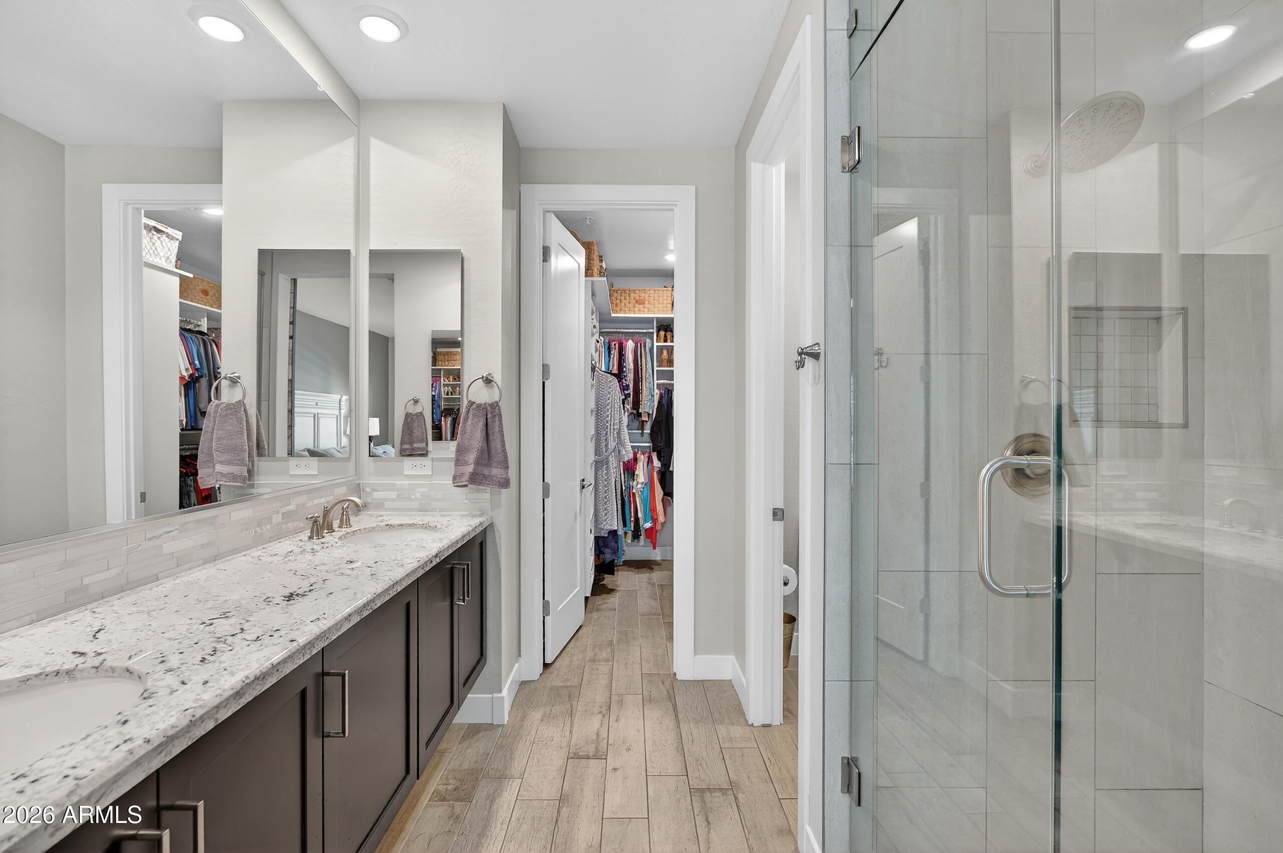 3855 South McQueen Road, Unit 59 Chandler, AZ 85286 - Photo 25 of 56 a bathroom with a granite countertop sink mirror and shower