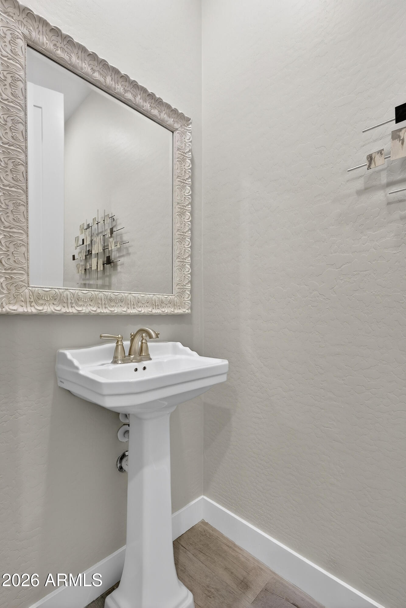 3855 South McQueen Road, Unit 59 Chandler, AZ 85286 - Photo 28 of 56 a bathroom with a sink and a mirror