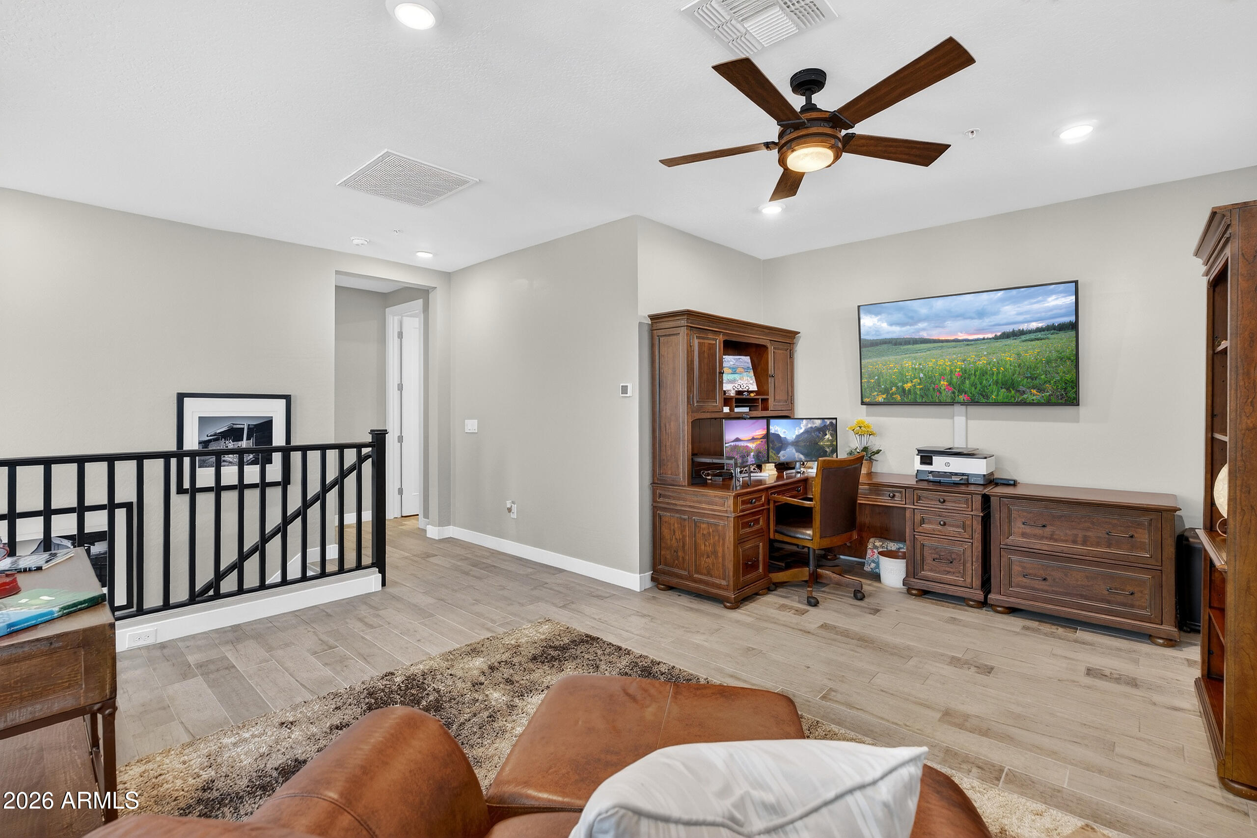 3855 South McQueen Road, Unit 59 Chandler, AZ 85286 - Photo 31 of 56 a living room with furniture and a flat screen tv