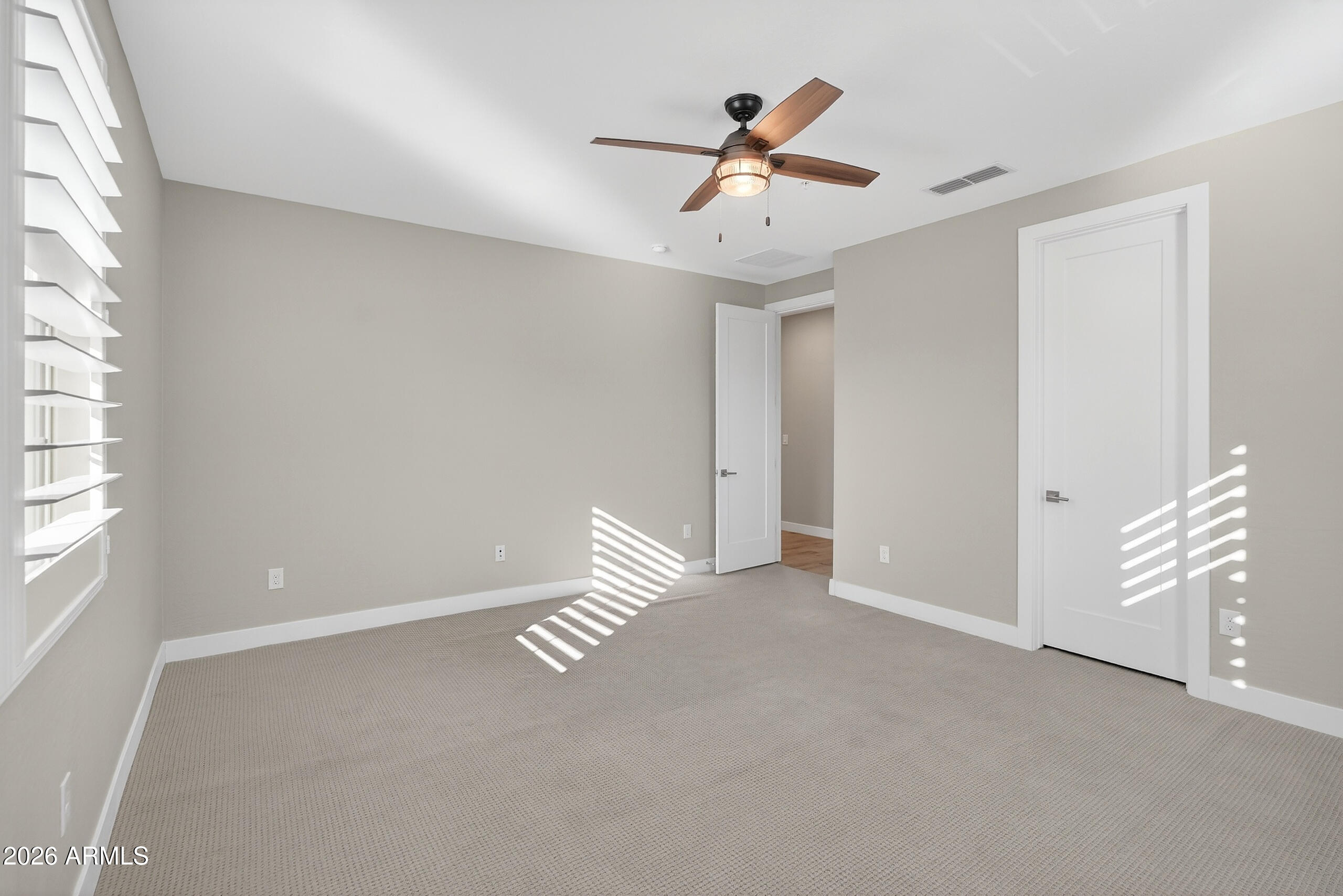 3855 South McQueen Road, Unit 59 Chandler, AZ 85286 - Photo 36 of 56 a view of an empty room with a window