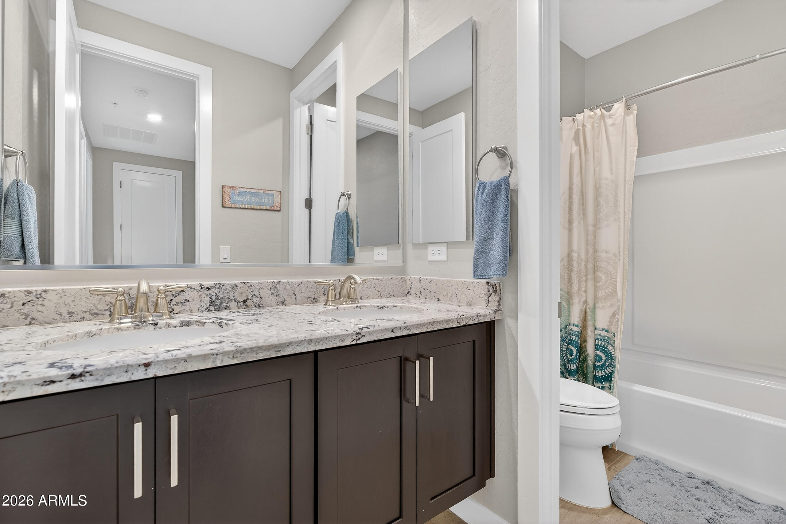 3855 South McQueen Road, Unit 59 Chandler, AZ 85286 - Photo 38 of 56 a bathroom with a granite countertop sink toilet and shower