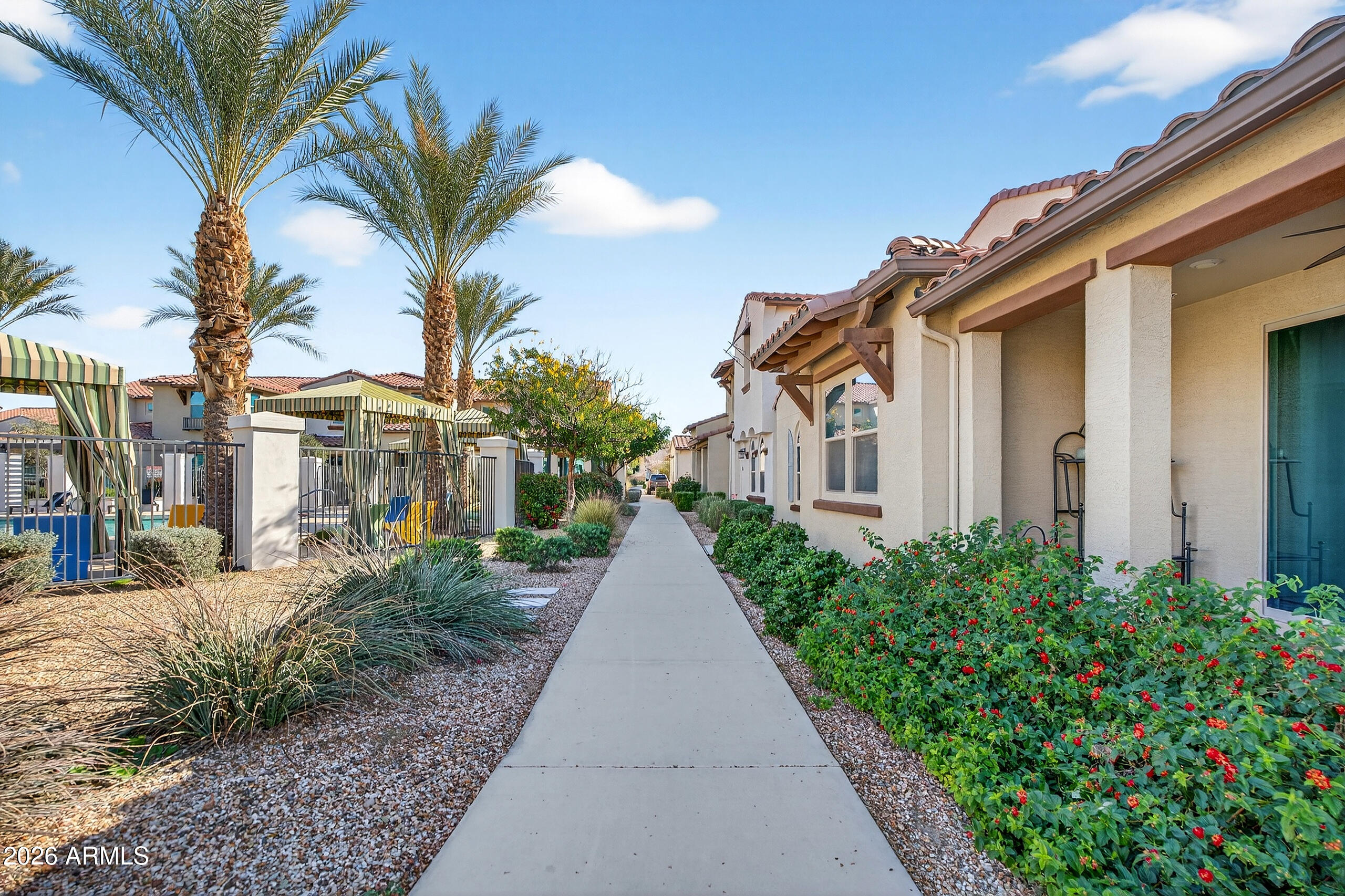 3855 South McQueen Road, Unit 59 Chandler, AZ 85286 - Photo 44 of 56 a view of a pathway with a house on both side
