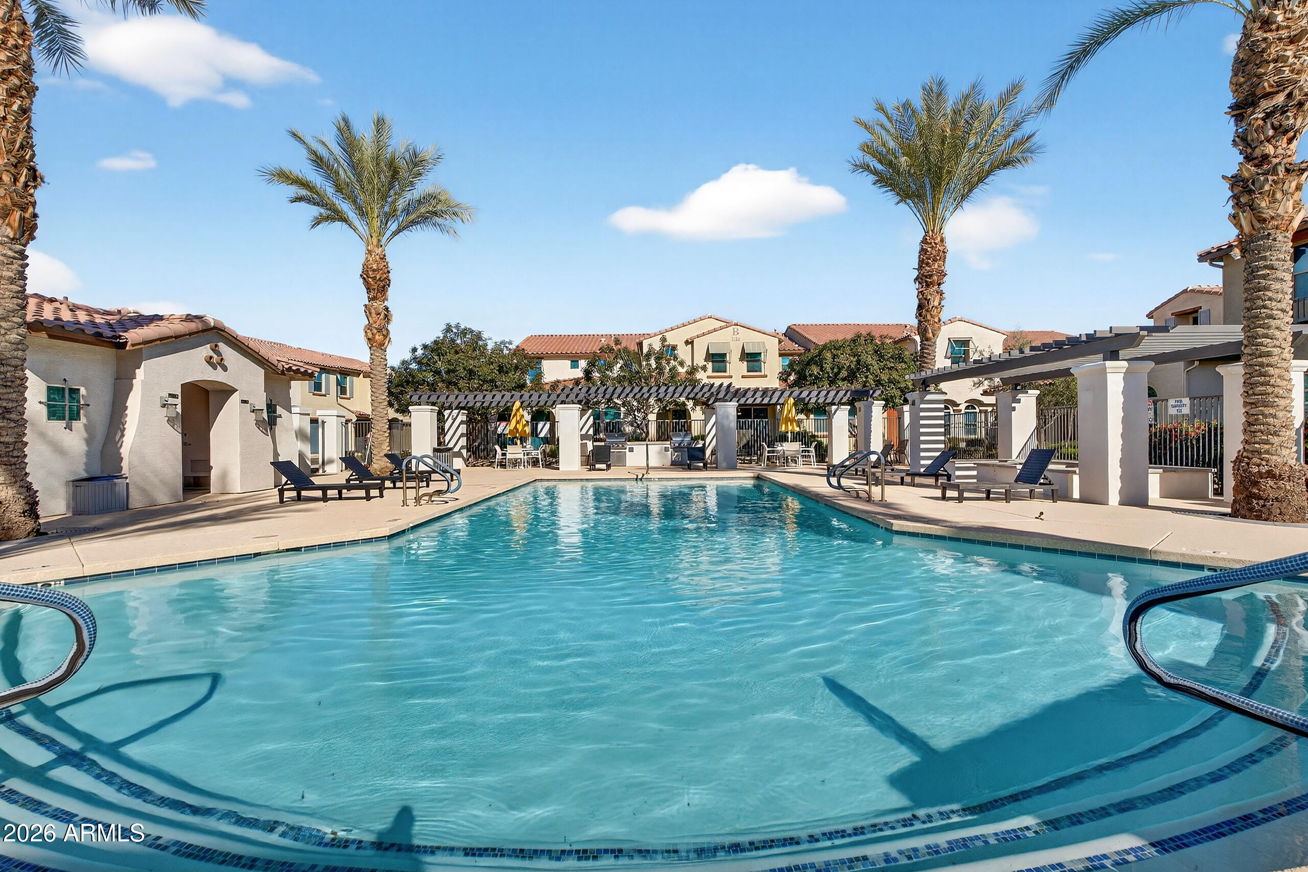 3855 South McQueen Road, Unit 59 Chandler, AZ 85286 - Photo 45 of 56 a swimming pool view with a lake view