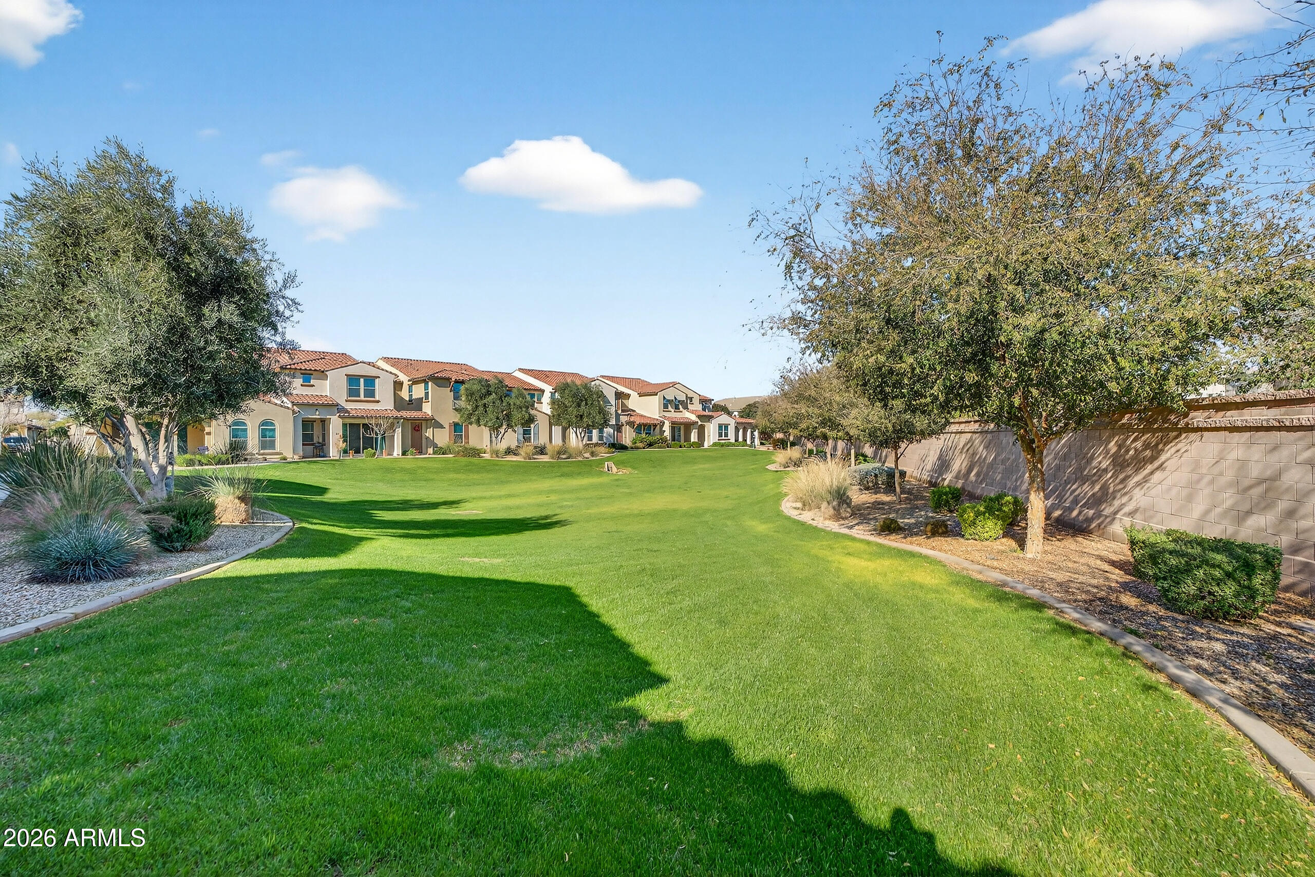 3855 South McQueen Road, Unit 59 Chandler, AZ 85286 - Photo 55 of 56 a view of a house with a big yard