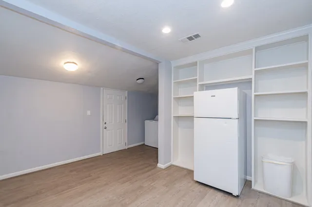 a view of a storage & utility room with washer and dryer