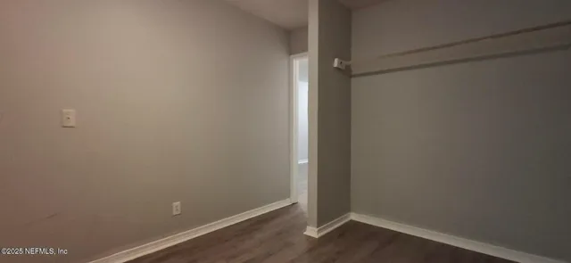 a view of small space with wooden floor