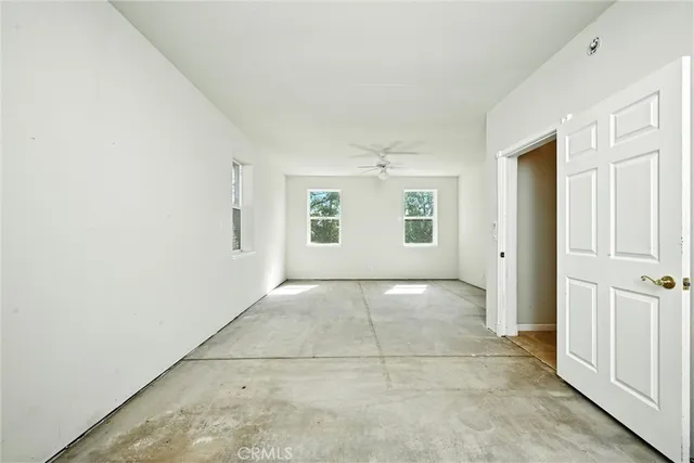 an empty room with windows