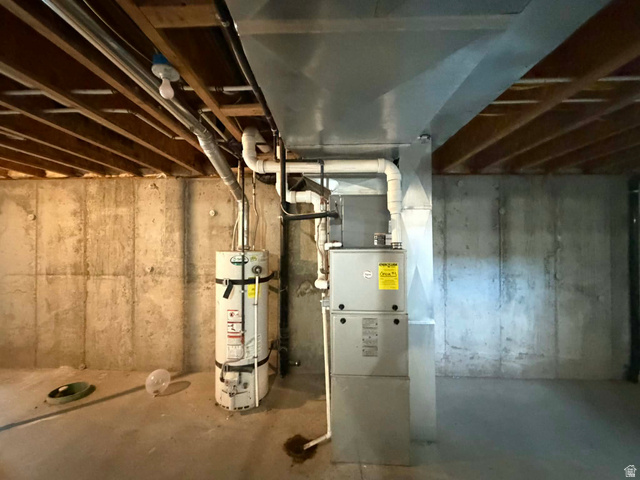 2095 West 4100 North Spring Glen, UT 84526 - Photo 21 of 35 Unfinished basement with strapped water heater