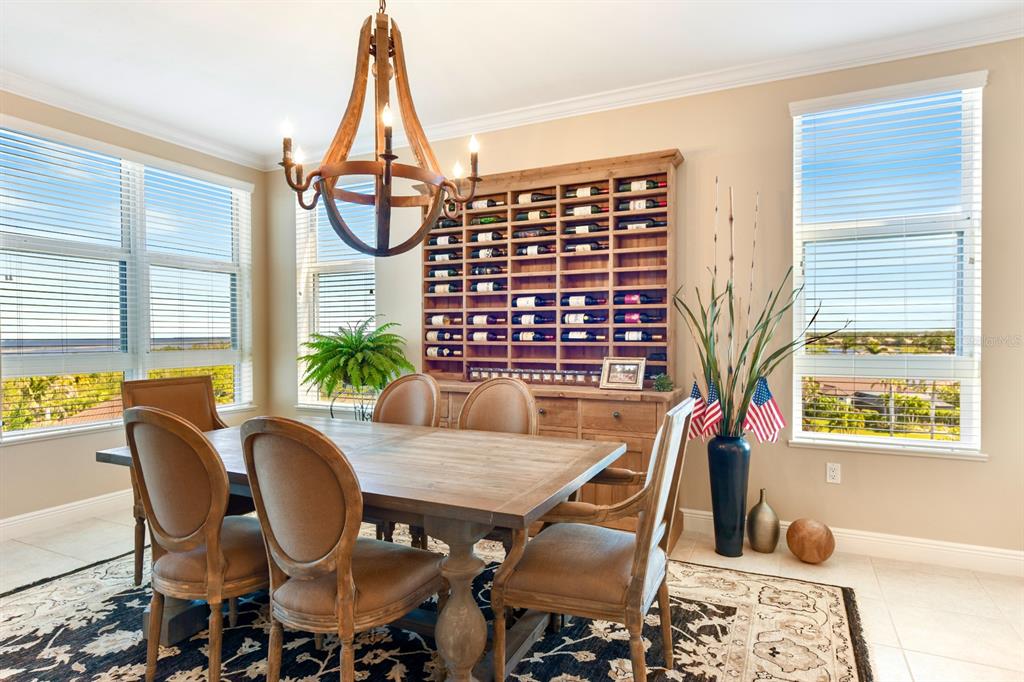 3333 Sunset Key Circle, Unit 407 Punta Gorda, FL 33955 - Photo 16 of 78 a dining room with furniture and window