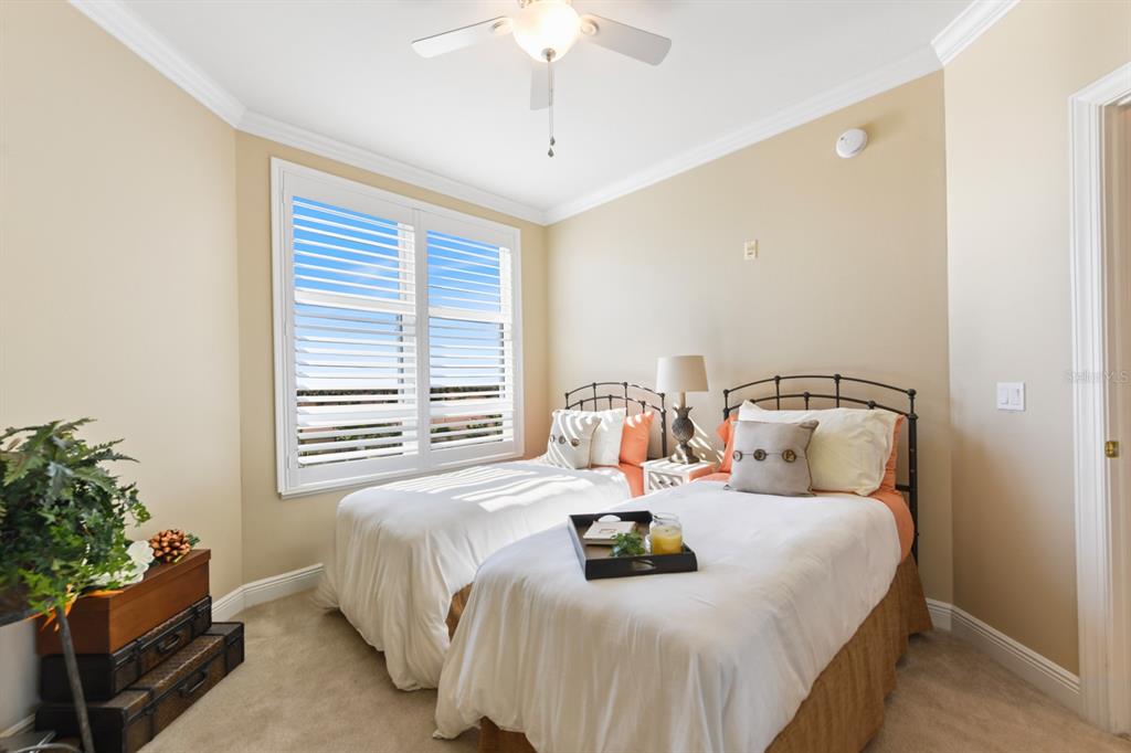 3333 Sunset Key Circle, Unit 407 Punta Gorda, FL 33955 - Photo 39 of 78 a bedroom with bed and a window