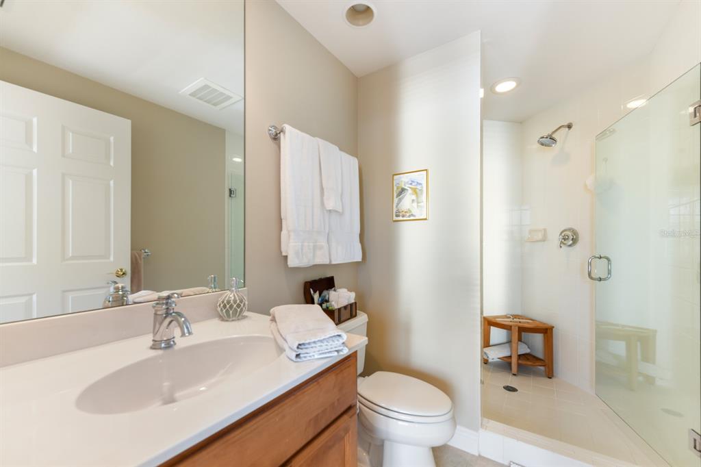 3333 Sunset Key Circle, Unit 407 Punta Gorda, FL 33955 - Photo 43 of 78 a bathroom with a sink toilet and shower