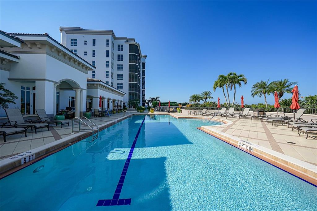 3333 Sunset Key Circle, Unit 407 Punta Gorda, FL 33955 - Photo 52 of 78 a view of a swimming pool with an outdoor seating