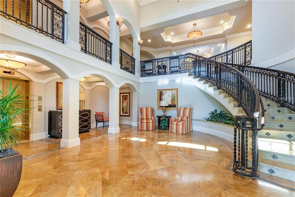 3333 Sunset Key Circle, Unit 407 Punta Gorda, FL 33955 - Photo 54 of 78 a view of entryway and hall with wooden floor