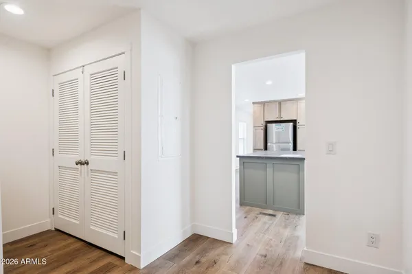 a view of kitchen and wooden floor