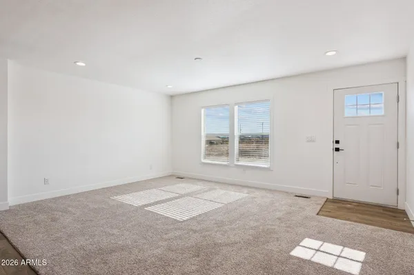 an empty room with windows