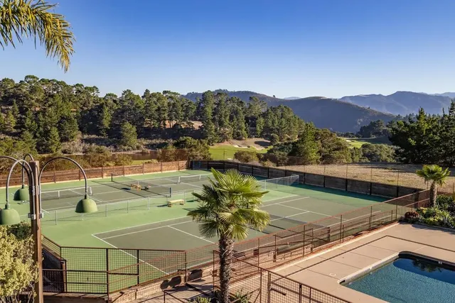a view of swimming pool with outdoor seating