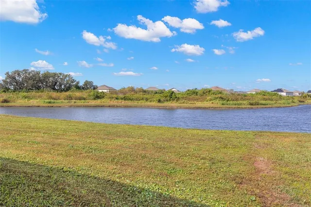 a view of an ocean and city