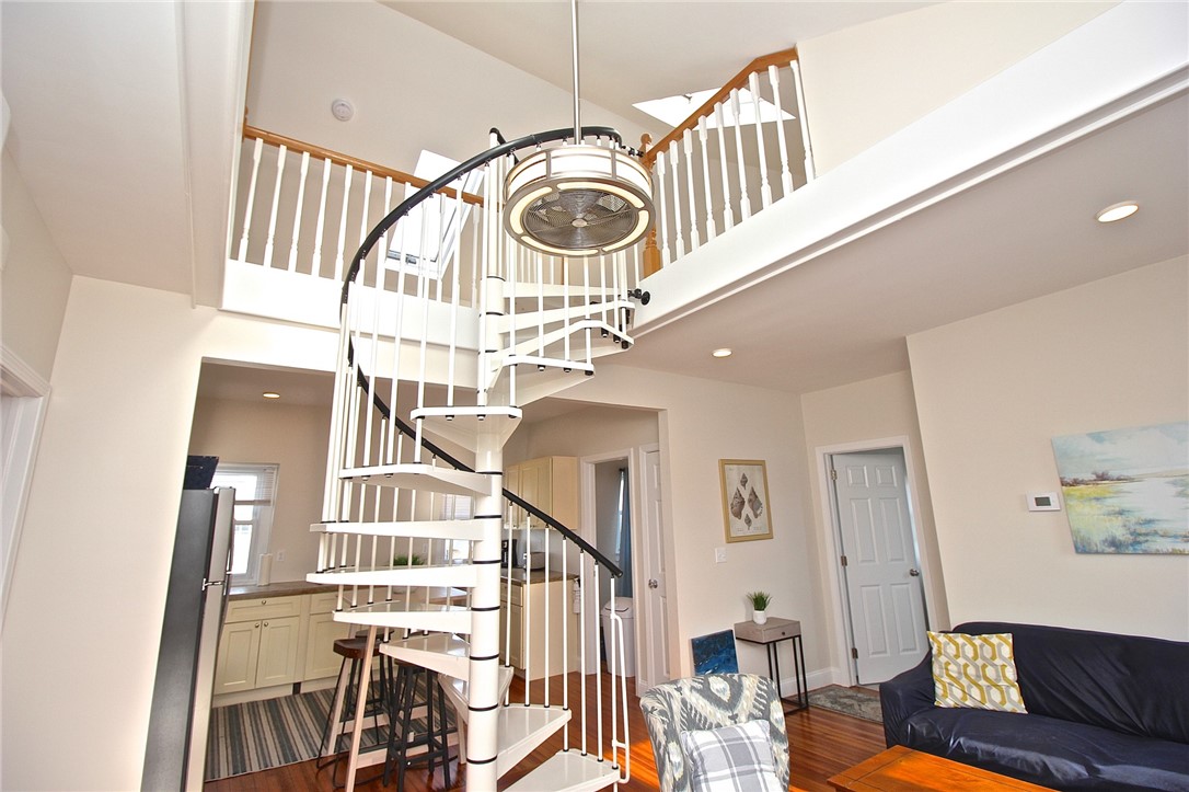 668 Thames Street, Unit 3 Newport, RI 02840 - Photo 45 of 47 Floor plan view from living room to kitchen, spiral to loft