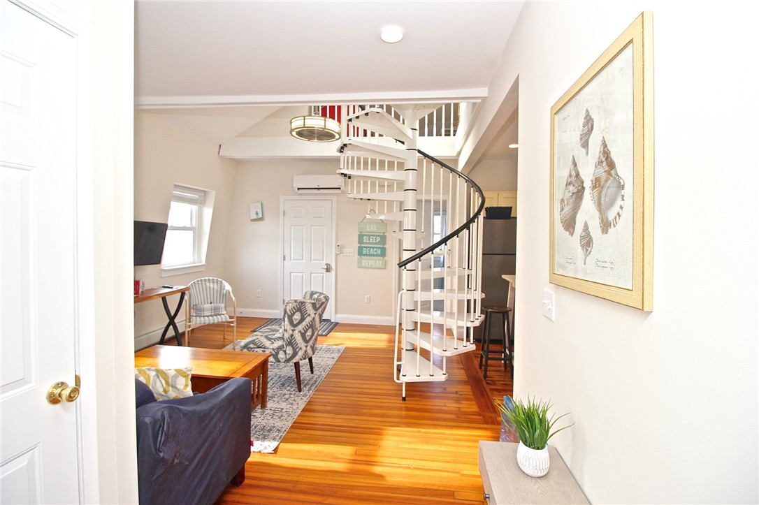668 Thames Street, Unit 3 Newport, RI 02840 - Photo 31 of 47 Living Room view to spiral stair to loft