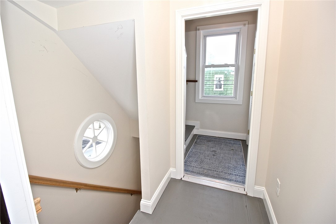 668 Thames Street, Unit 3 Newport, RI 02840 - Photo 6 of 47 Common Stairway from 1st floor to landing for apt 2 then view to stairway to apt 3