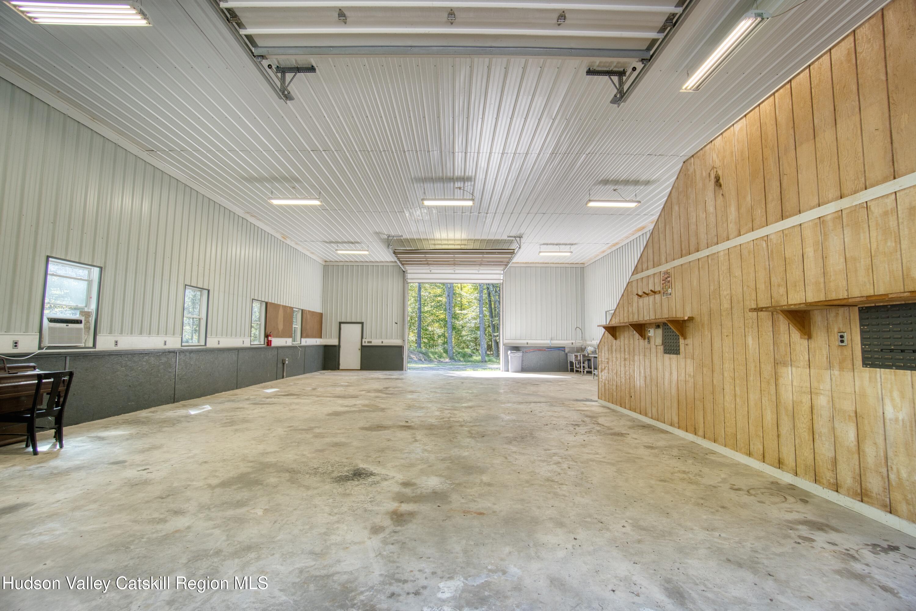177 Buck Road Stone Ridge, NY 12484 - Photo 32 of 37 a view of an empty room with a window