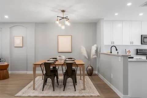 a view of a dining room with furniture