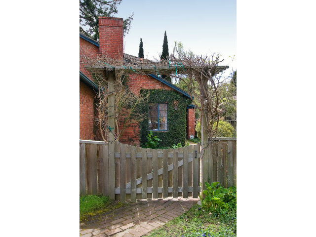 325 Princeton Road Menlo Park, CA 94025 - Photo 2 of 15 a view of a house with a yard and potted plants
