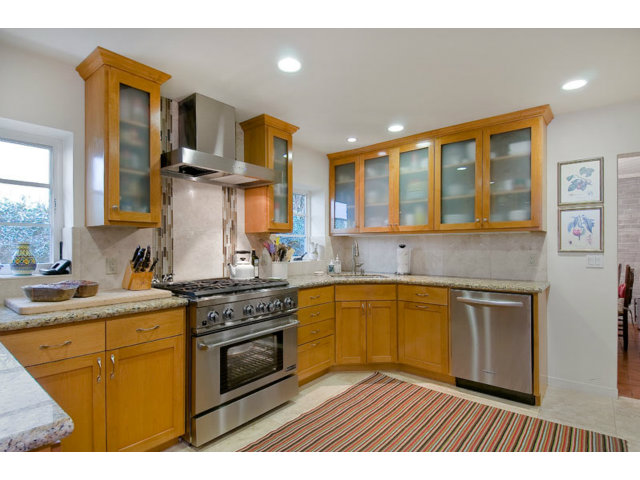 325 Princeton Road Menlo Park, CA 94025 - Photo 4 of 15 a kitchen with stainless steel appliances granite countertop a stove sink and cabinets