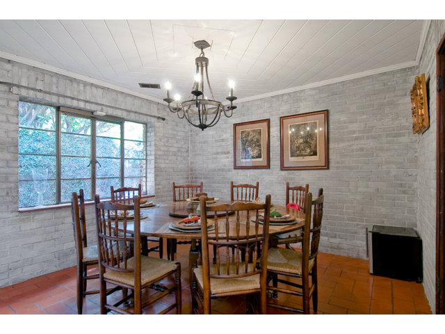 325 Princeton Road Menlo Park, CA 94025 - Photo 6 of 15 a view of a dining room with furniture a chandelier and wooden floor