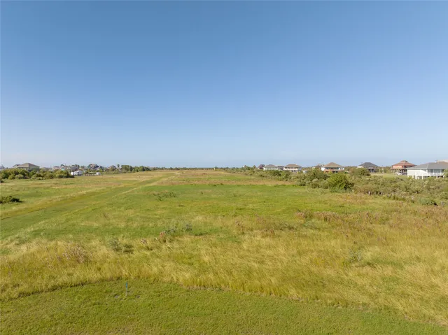 a view of a house with a big yard